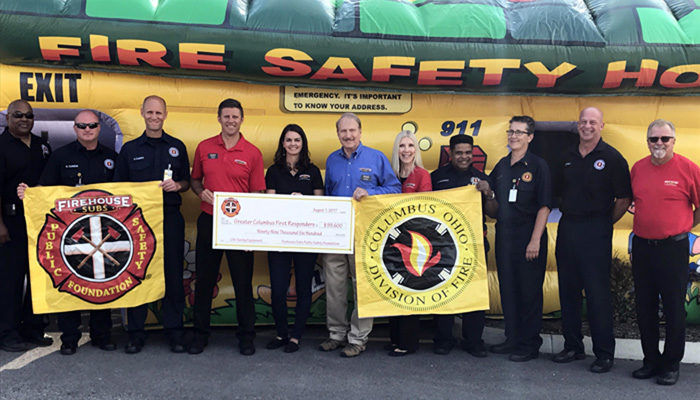 Photo of Firehouse Subs donatiing to the city of Columbus division of fire